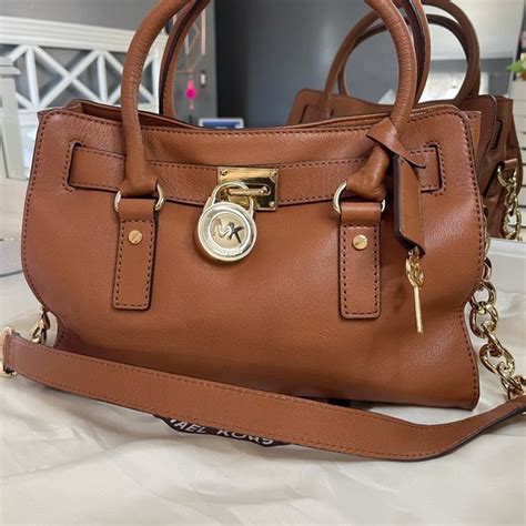 michael kors purse satchel with gold trim and lock|Michael Kors purse manhattan.